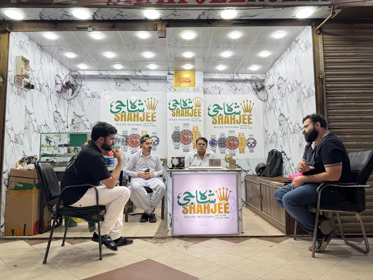 Shahjee Rolex Dealer shop interior with staff — Elphy Center, Saddar, Karachi